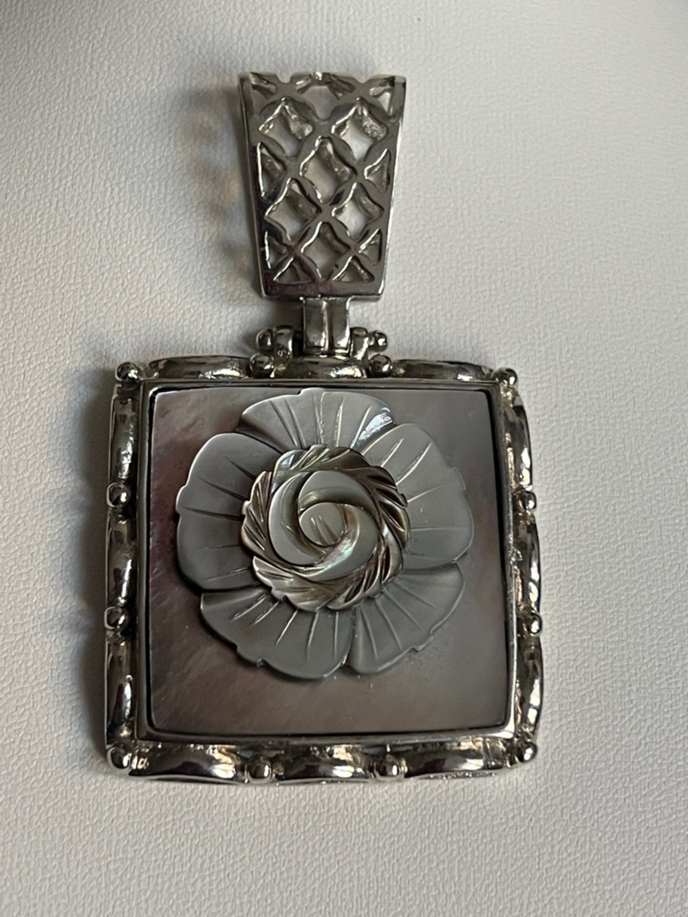 Silver and Cream Mother of Pearl Floral Pendant